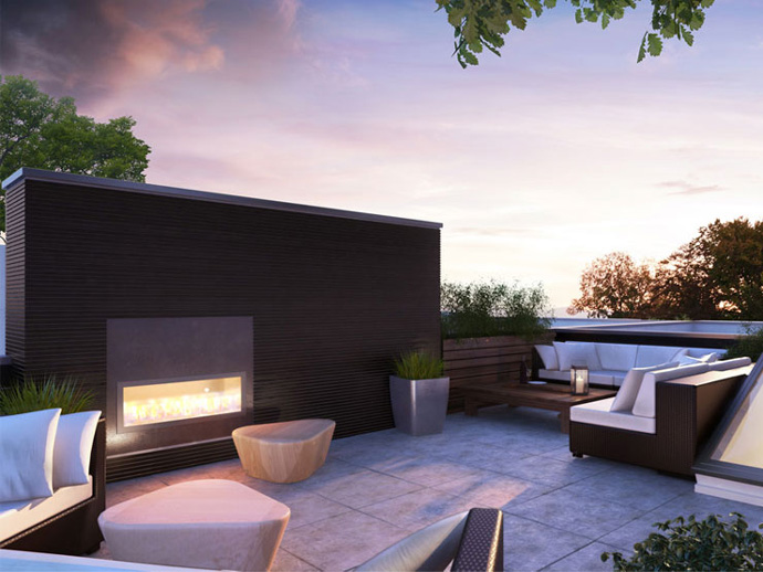 The beautiful exterior fireplaces on the rooftop deck at the modern Vancouver Kits BLANC townhomes for sale.