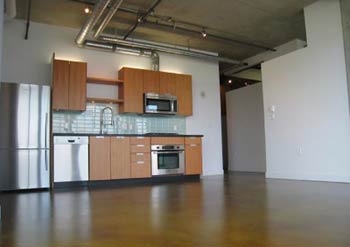 The kitchens and open spaces at the Loft 495 Kits apartment condos in Vancouver are truly impressive